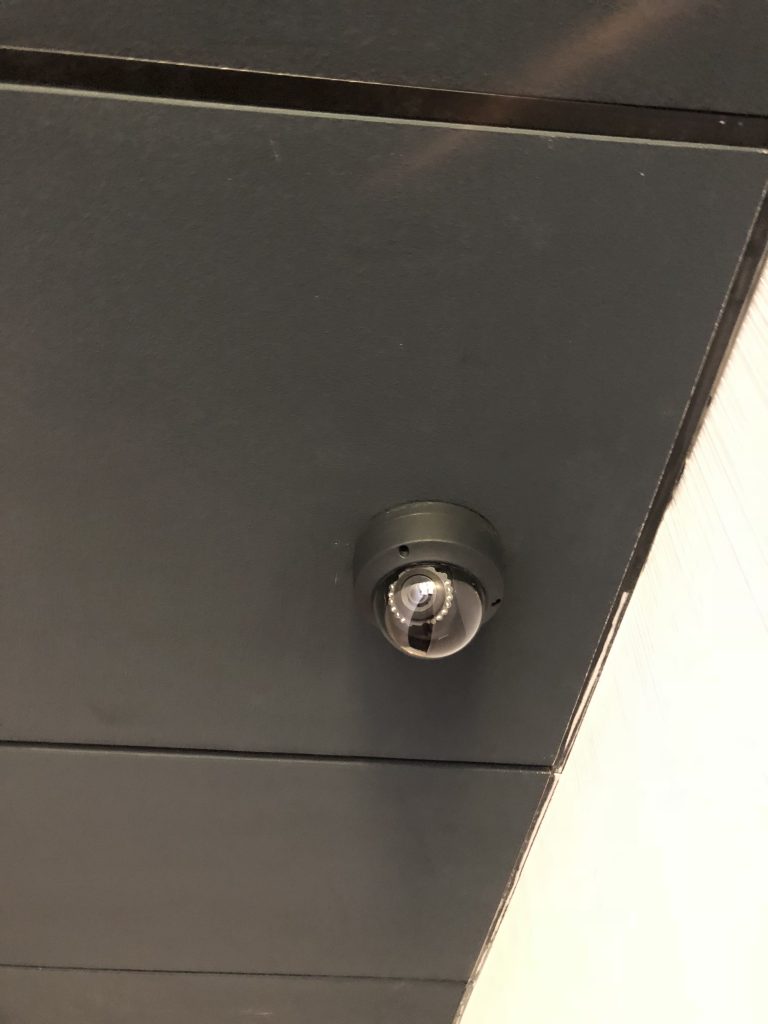 Interior dome camera shown installed on a ceiling