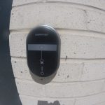 SmartAir lock installed on an exterior brock wall